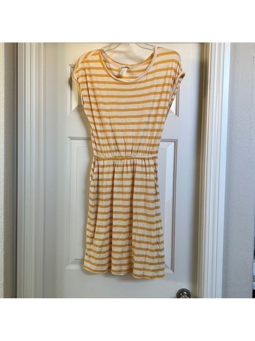Women’s H & M basics yellow and white striped elastic waist dress. Size S